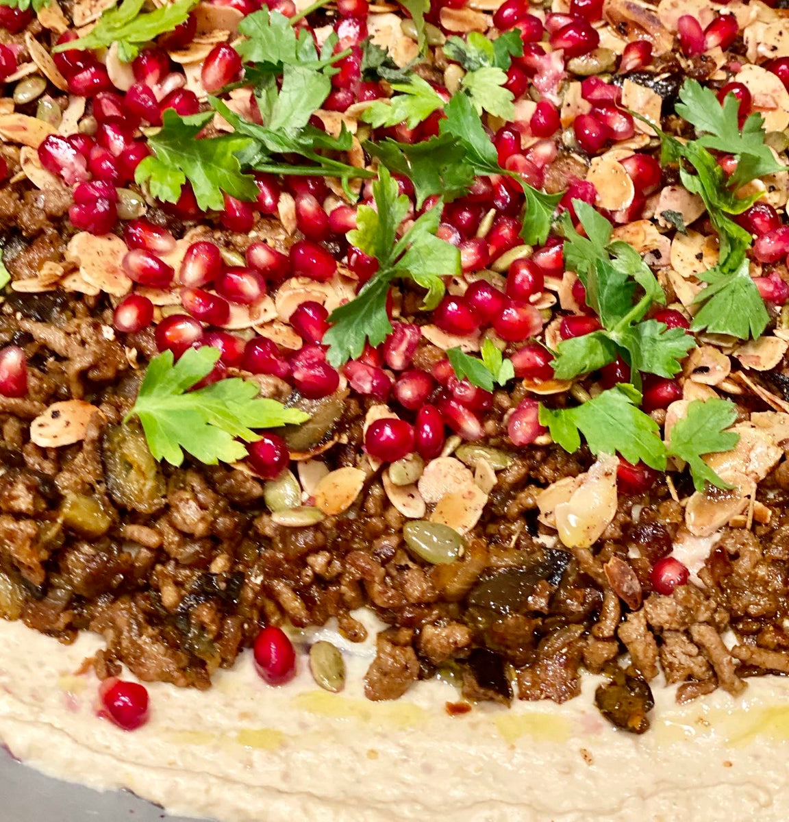 Loaded Hummus with Ground Lamb, Eggplant and Pomegranate &ndash; Squelo