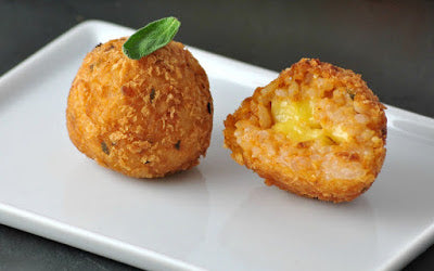 Savory, cheesy, and pumpkin-y, these rice balls are everything you never knew you