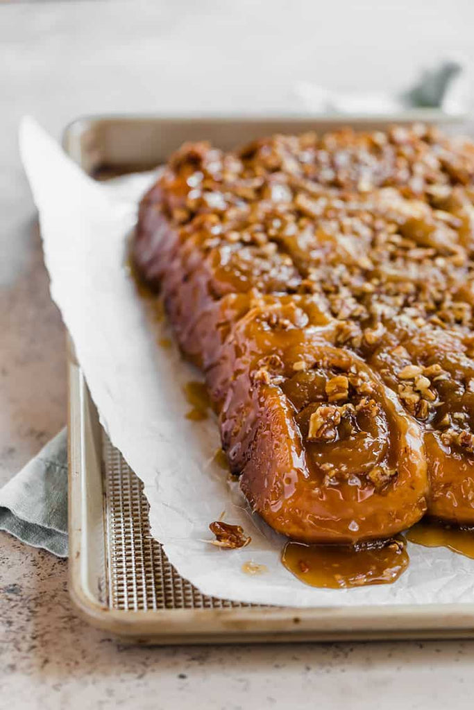 This old-fashioned sticky buns recipe comes complete with a decadent caramel glaze and chopped pecans