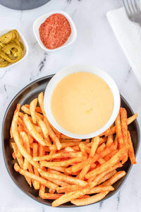 Taco Bell Nacho Fries are deliciously seasoned with Mexican spices and served with creamy cheese sauce