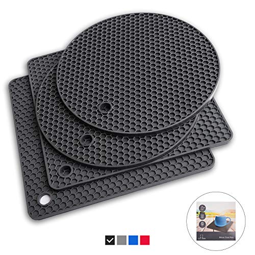 Q's INN Black Silicone Trivet Mats | Hot Pot Holders | Drying Mat. Our 7 in 1 potholder Kitchen Tool is Heat Resistant to 440°F, Non-slip,durable, flexible easy to wash and dry and Contains 4 pcs.
